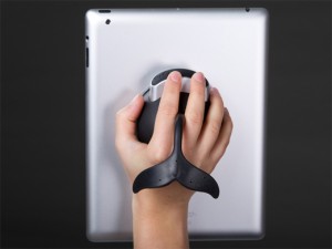 Photograph of the Whale Kit iPad holder attached to the back of an iPad.